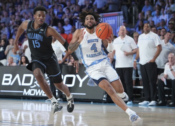 Jordan 14 hotsell north carolina